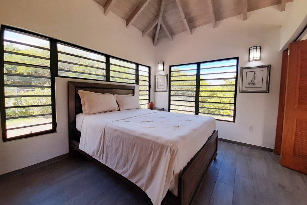 Aerial view of the Hidden Gem home in a serene neighborhood