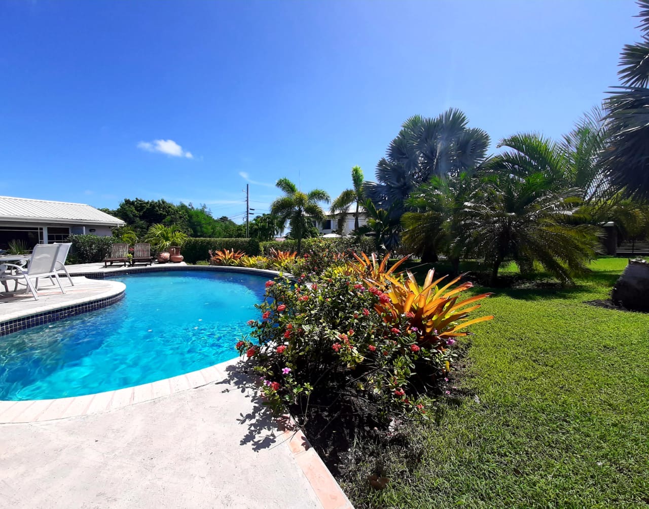Landscaped garden surrounding the Hidden Gem property