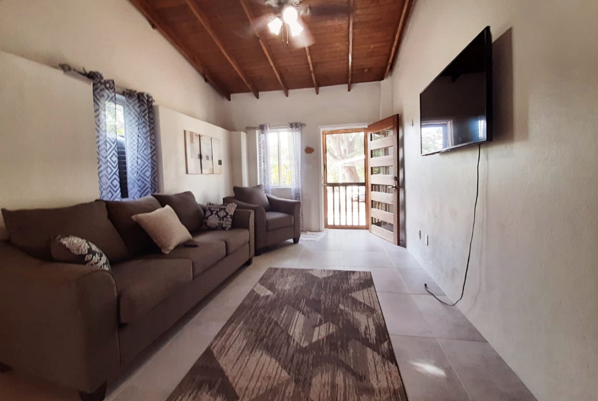 Hodges Bay E-Villa with Pool for Rent - Living Room