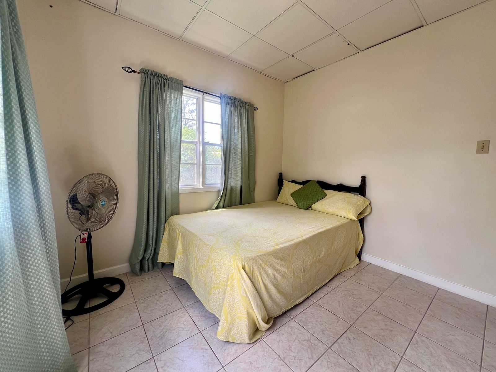 Beautiful bedroom at Emerald Breeze Cottage.