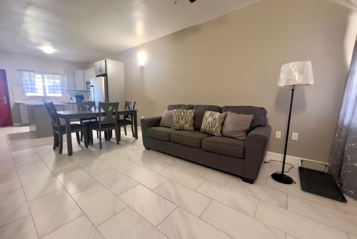 Royal Rose Apt 1A (Lower Floor)