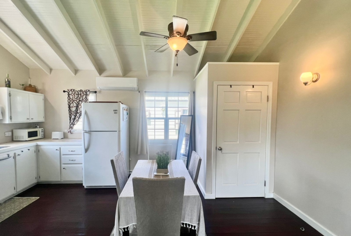 Fully furnished kitchen and dining area in Royal Gardens cottage for rent